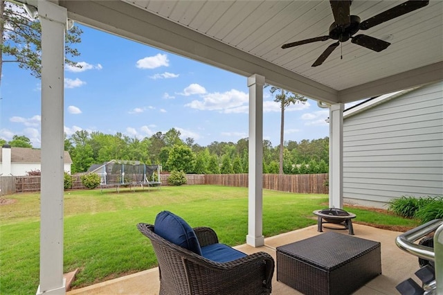777 Tucker Trl, Bremen, GA 30110 - view of patio featuring a trampoline, ceiling fan, and a fire pit