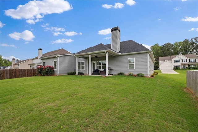 777 Tucker Trl, Bremen, GA 30110 - rear view of property with a ceiling fan, a patio area, and a chimney