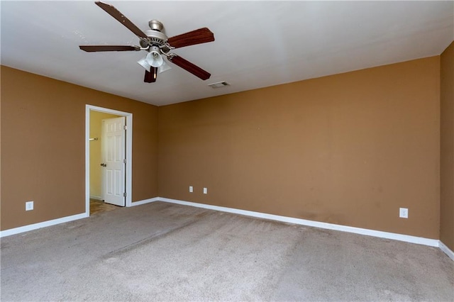 carpeted empty room with ceiling fan