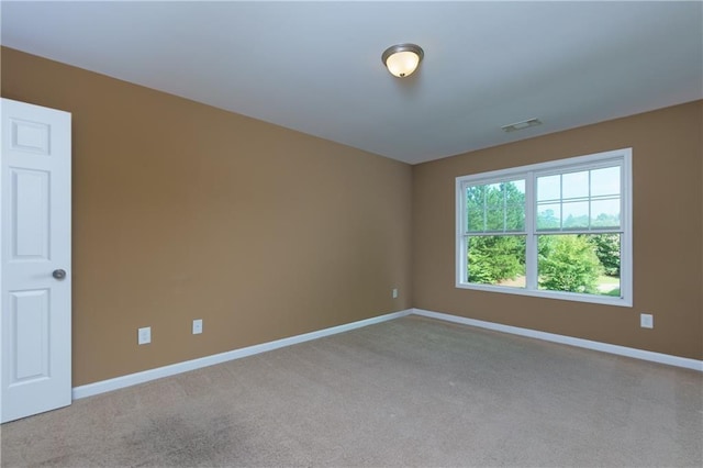 view of carpeted spare room