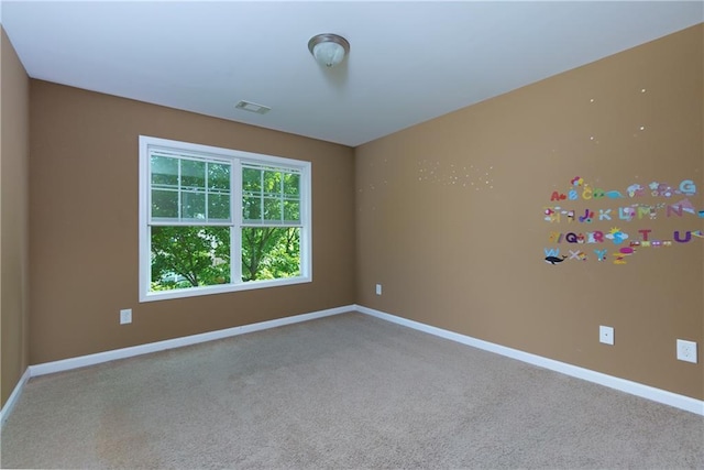 unfurnished room featuring carpet floors