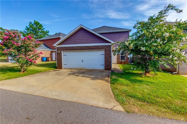 view of front facade featuring a front yard and a garage