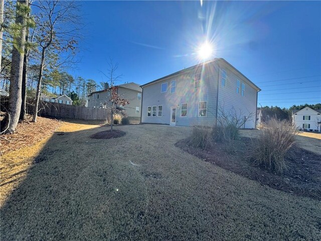4005 Riverchess Dr SW, Atlanta, GA 30331 - rear view of property featuring a yard
