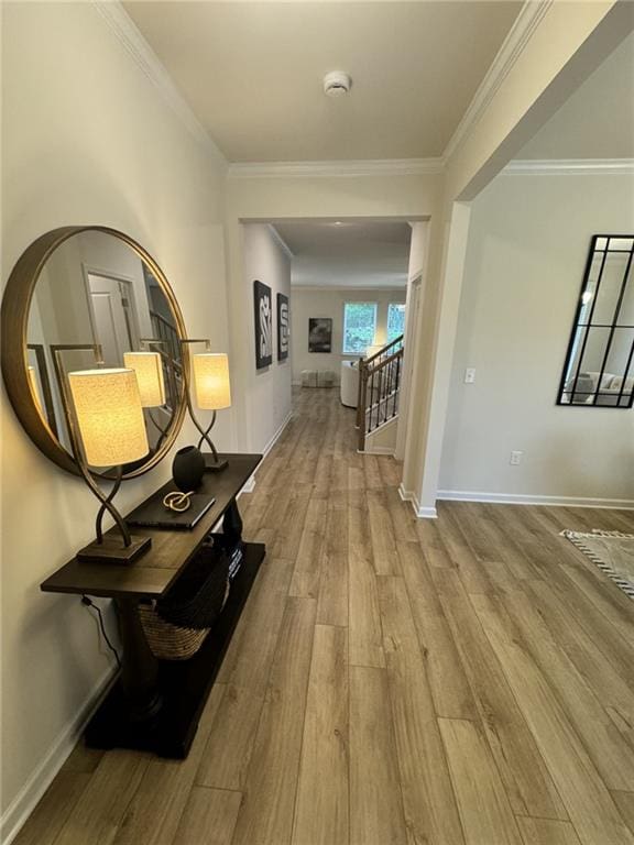 4005 Riverchess Dr SW, Atlanta, GA 30331 - hallway featuring ornamental molding and light hardwood / wood-style floors