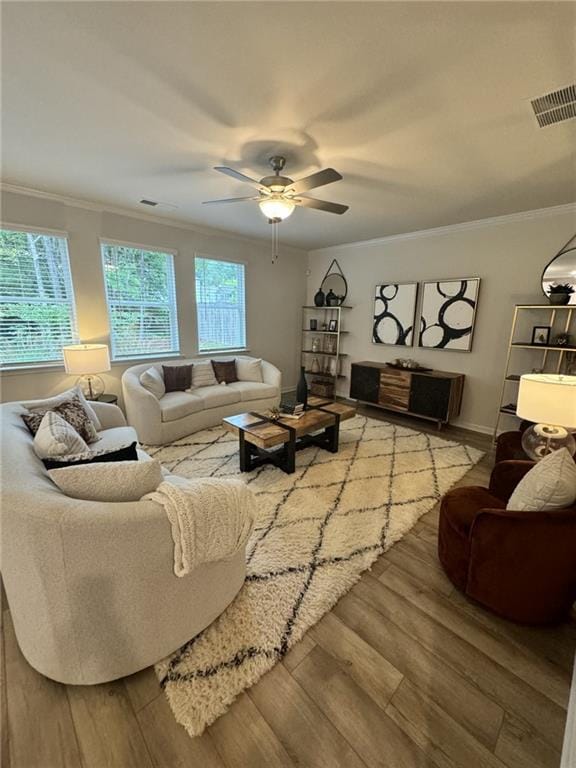 4005 Riverchess Dr SW, Atlanta, GA 30331 - living room featuring crown molding, ceiling fan, and light hardwood / wood-style floors