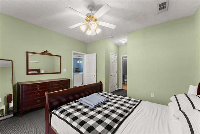 bedroom with visible vents, dark carpet, a textured ceiling, and ceiling fan