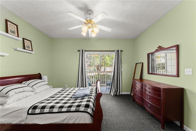 carpeted bedroom featuring access to outside, a ceiling fan, baseboards, and a textured ceiling