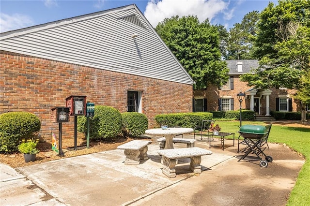 6700 Roswell Rd Unit 21E, Sandy Springs, GA 30328 - view of patio featuring area for grilling