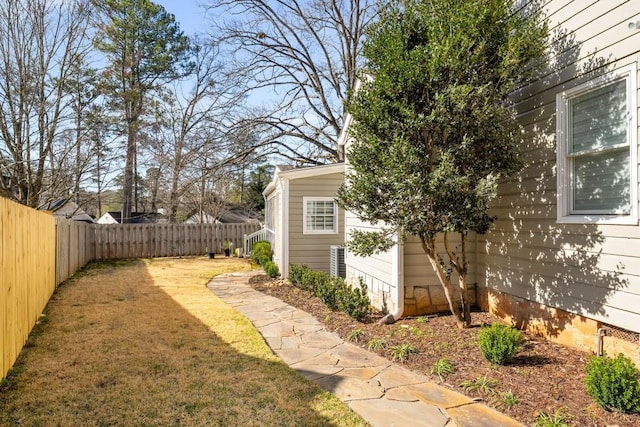 view of yard featuring a fenced backyard