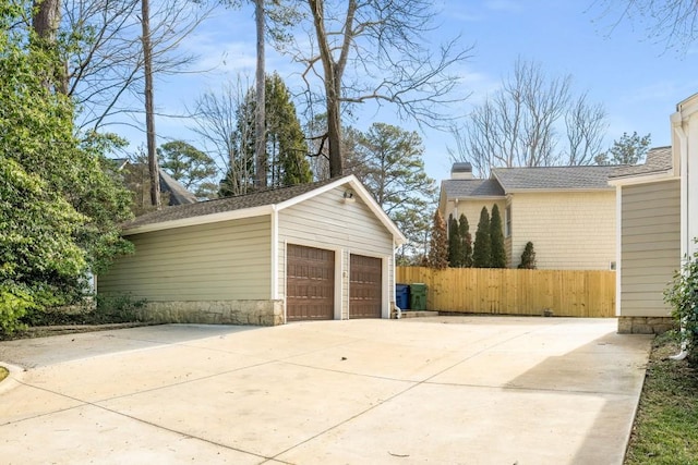 detached garage with fence