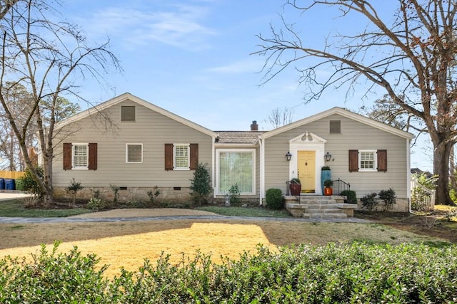 view of front of house featuring crawl space