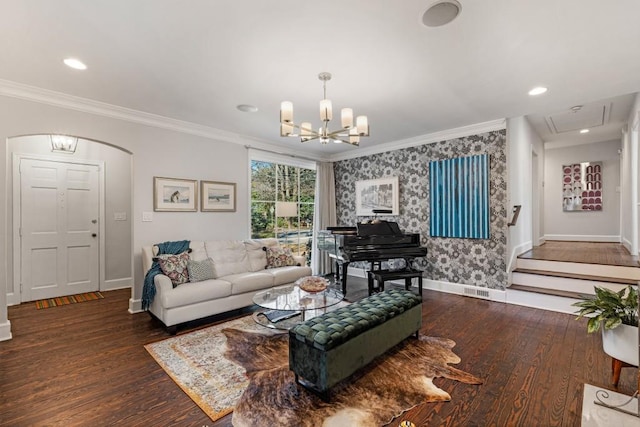 living area featuring an inviting chandelier, wood finished floors, and baseboards