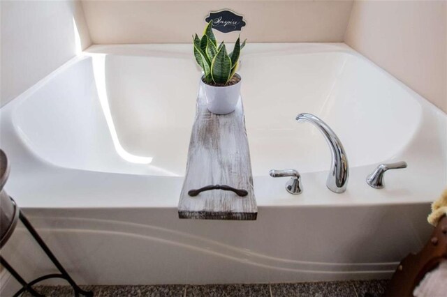 room details featuring a garden tub