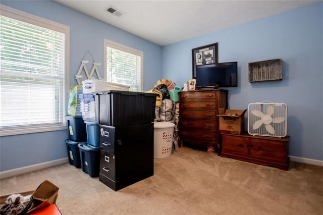 613 Hemlock Ct, Villa Rica, GA 30180 - carpeted bedroom featuring baseboards, multiple windows, and visible vents