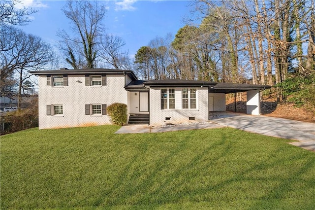 split level home featuring a carport and a front lawn