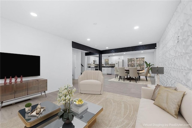 living room with light hardwood / wood-style floors