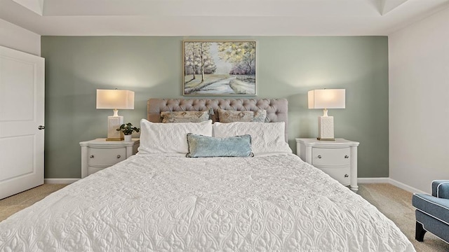 bedroom featuring light colored carpet