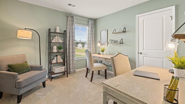 office area featuring light colored carpet