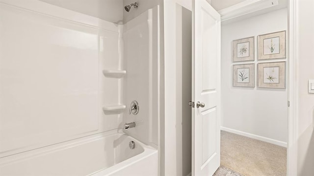 bathroom with shower / washtub combination