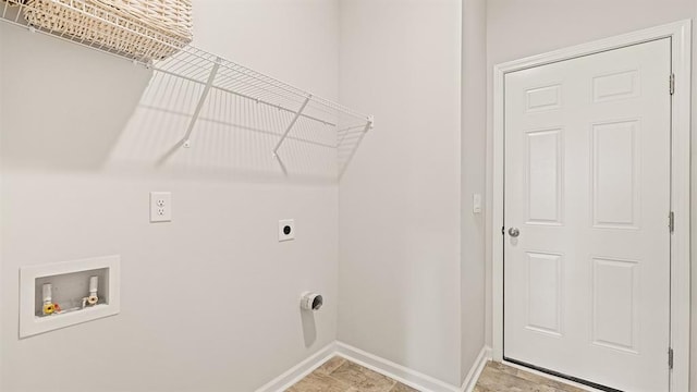 laundry area with electric dryer hookup and washer hookup