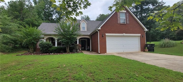 view of front of house with a garage and a front yard