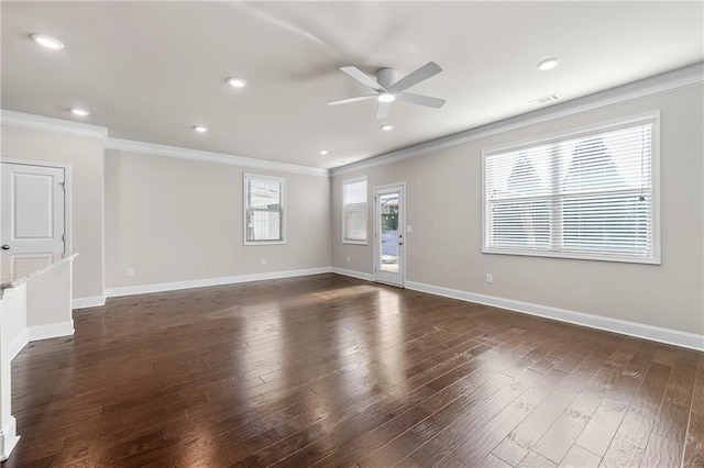 spare room with crown molding, ceiling fan, and dark hardwood / wood-style flooring