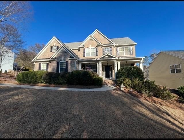 view of front of home with brick siding