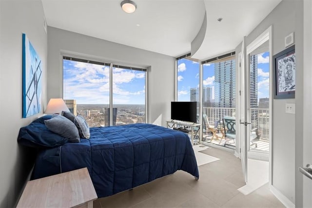 400 W Peachtree St NW Unit 3611, Atlanta, GA 30308 - tiled bedroom featuring access to outside