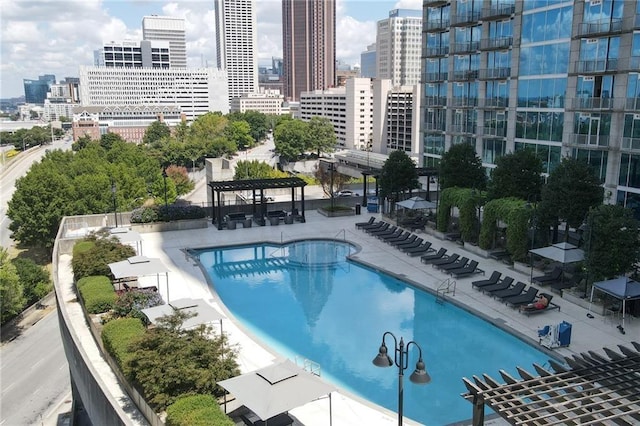 400 W Peachtree St NW Unit 3611, Atlanta, GA 30308 - community pool with a pergola, a view of city, and a patio area