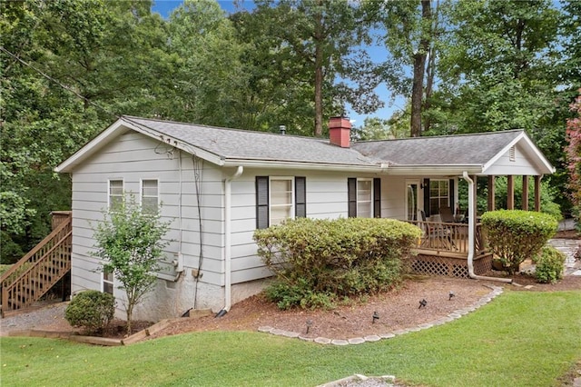 307 Little Hickory Ln, Woodstock, GA 30189 - ranch-style home with a front yard, a porch, a chimney, stairway, and roof with shingles