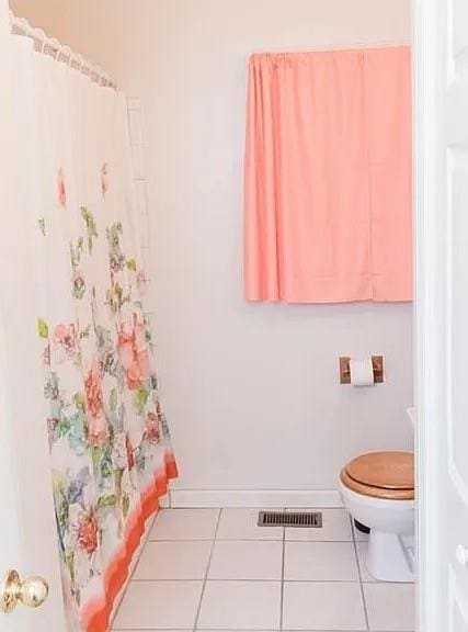 307 Little Hickory Ln, Woodstock, GA 30189 - bathroom with tile patterned flooring and curtained shower
