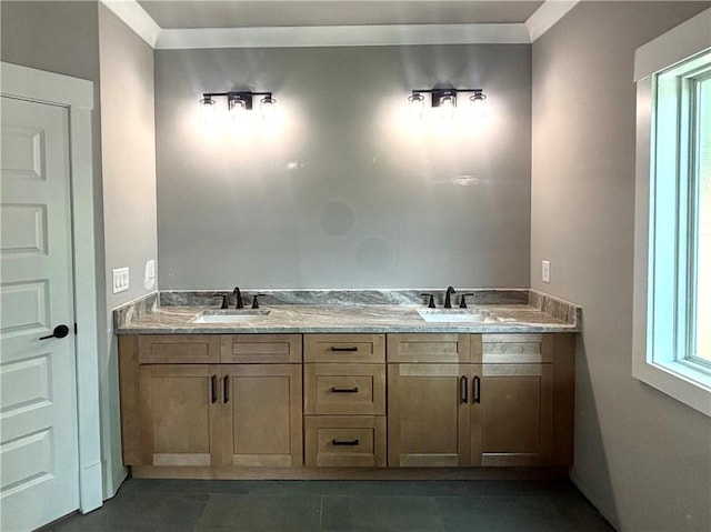 bathroom with double vanity, tile patterned flooring, and a sink
