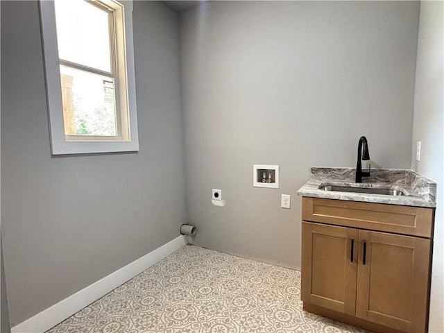 laundry area featuring a sink, laundry area, washer hookup, hookup for an electric dryer, and baseboards