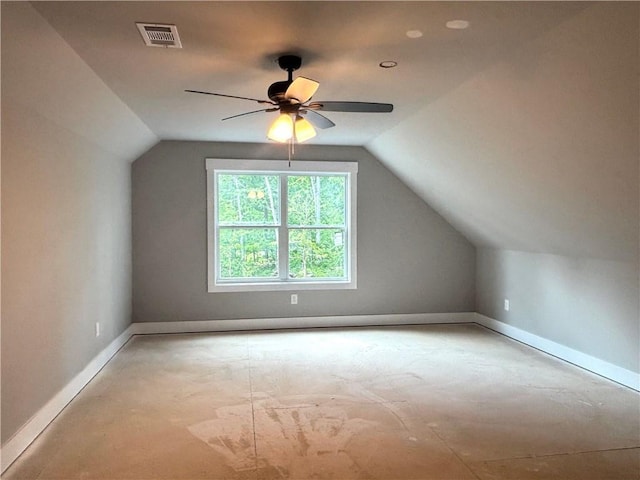 bonus room with lofted ceiling, baseboards, visible vents, and a ceiling fan