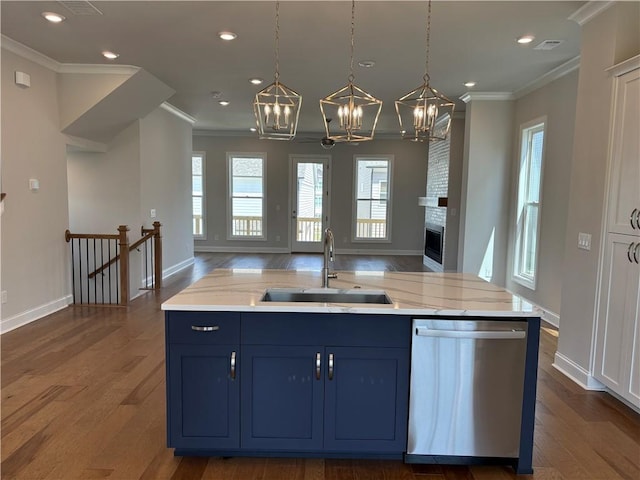 kitchen featuring a kitchen island with sink, sink, hardwood / wood-style flooring, and dishwasher