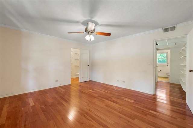 270 Lakemoore Dr NE Unit B, Atlanta, GA 30342 - unfurnished room with wood-type flooring, a ceiling fan, and crown molding