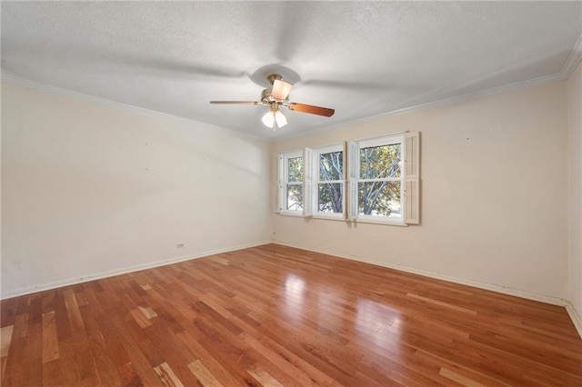 270 Lakemoore Dr NE Unit B, Atlanta, GA 30342 - spare room featuring crown molding, wood finished floors, ceiling fan, and a textured ceiling