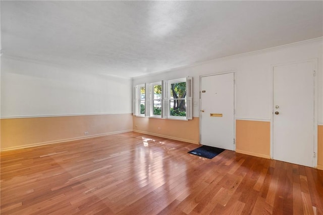 270 Lakemoore Dr NE Unit B, Atlanta, GA 30342 - empty room featuring wood finished floors and ornamental molding