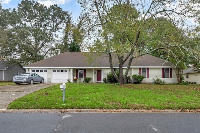 ranch-style home with a garage and a front lawn