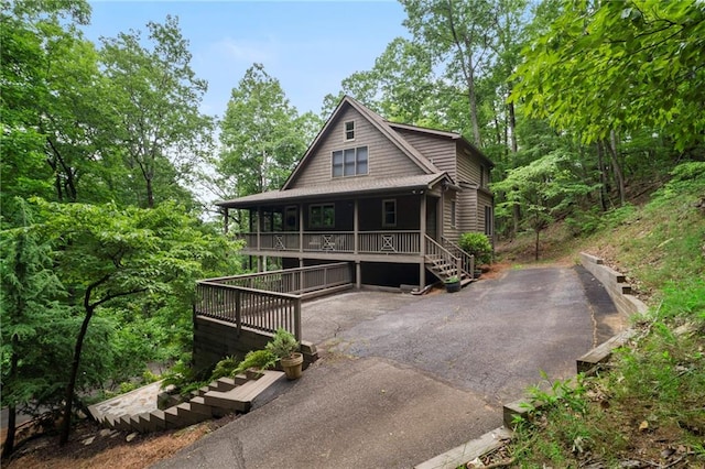 367 Windflower Dr, Big Canoe, GA 30143 - chalet / cabin with a porch and driveway