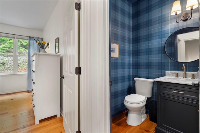 367 Windflower Dr, Big Canoe, GA 30143 - half bath featuring wallpapered walls, wood finished floors, and vanity