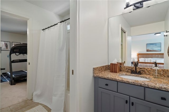 367 Windflower Dr, Big Canoe, GA 30143 - ensuite bathroom featuring vanity and shower / bath combination with curtain