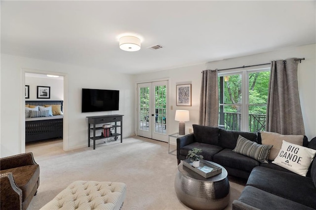367 Windflower Dr, Big Canoe, GA 30143 - living area featuring french doors and light carpet