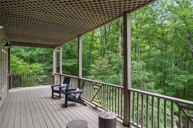 367 Windflower Dr, Big Canoe, GA 30143 - wooden deck with a forest view
