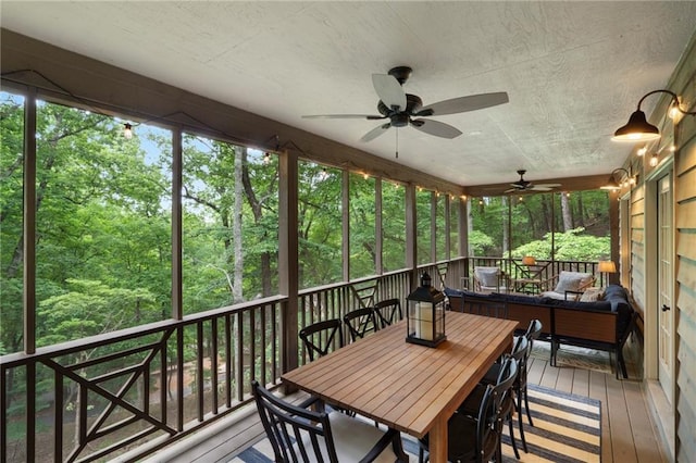 367 Windflower Dr, Big Canoe, GA 30143 - sunroom featuring ceiling fan and outdoor dining space