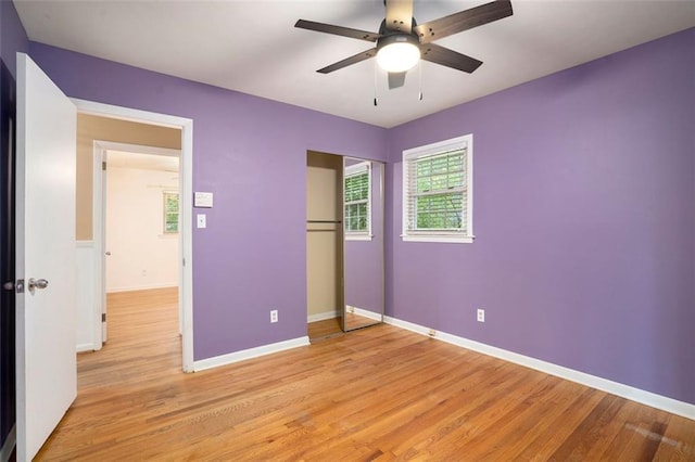 890 Oriole Ln SE, Marietta, GA 30067 - unfurnished bedroom featuring light wood finished floors, a closet, and baseboards