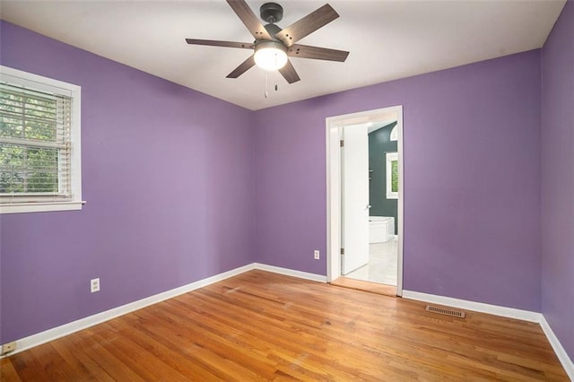 890 Oriole Ln SE, Marietta, GA 30067 - unfurnished room featuring ceiling fan, baseboards, and light wood-type flooring