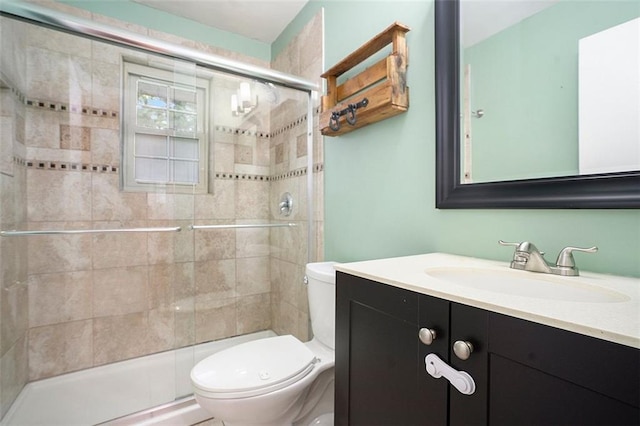 890 Oriole Ln SE, Marietta, GA 30067 - bathroom featuring toilet, vanity, and a stall shower