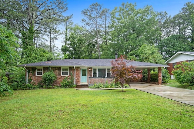 890 Oriole Ln SE, Marietta, GA 30067 - ranch-style house featuring concrete driveway, a front lawn, a carport, and brick siding
