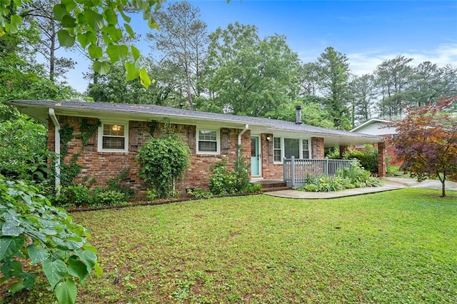 890 Oriole Ln SE, Marietta, GA 30067 - single story home with a front lawn, brick siding, covered porch, and a carport